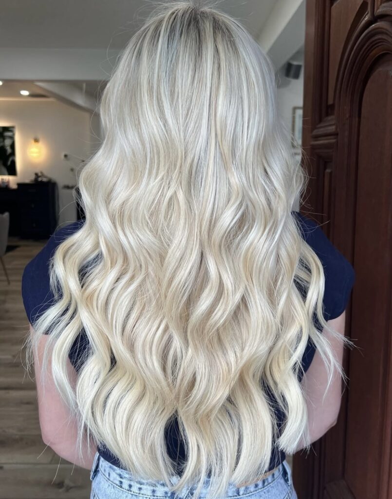 curly blonde extensions by chloe besch